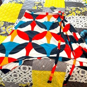 Beautiful multi colored skirt with high low features…